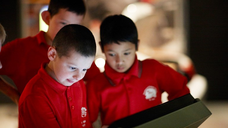 School children using the multimedia interactive