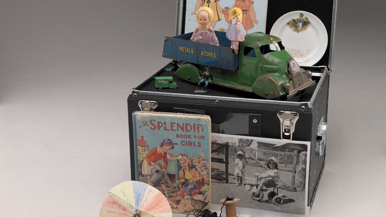 Various objects and props relating to childhood games used in reminiscing kit outreach programs