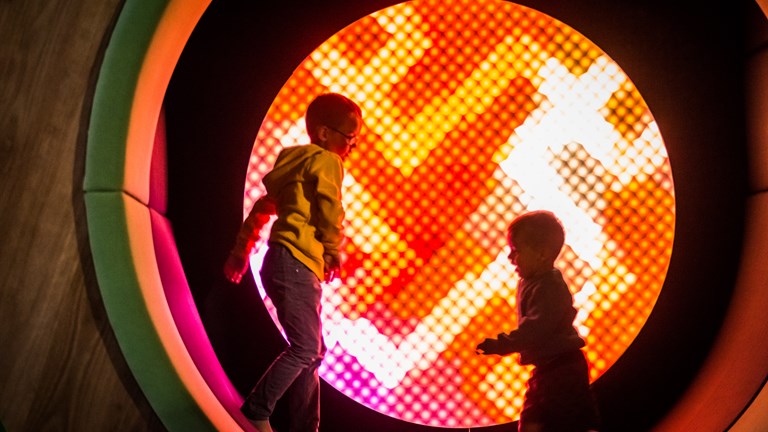 Two children playing in the Melbourne Museum Children's Gallery