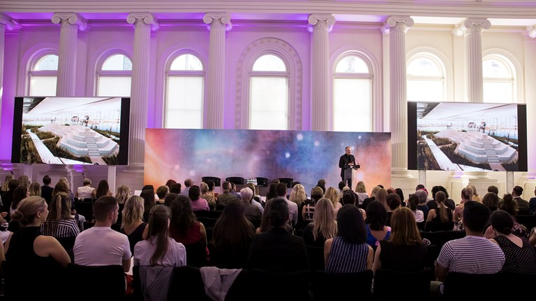 Event being held in the Long Room, Immigration Museum