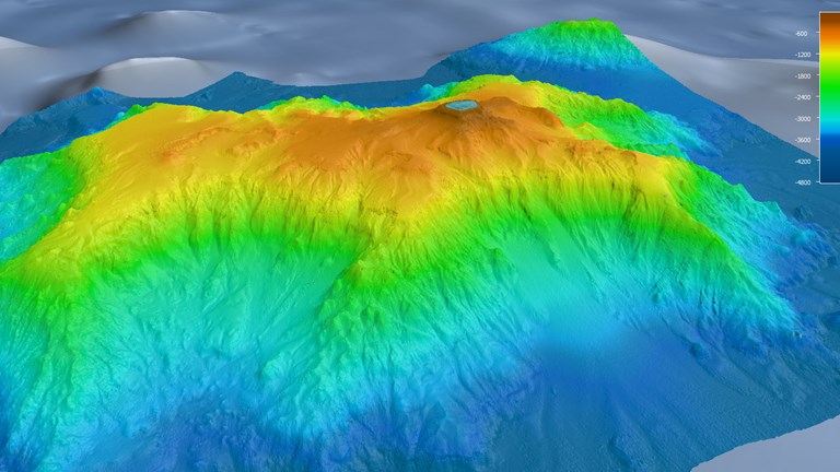 A computer generated, multi-coloured image of an underwater mountain