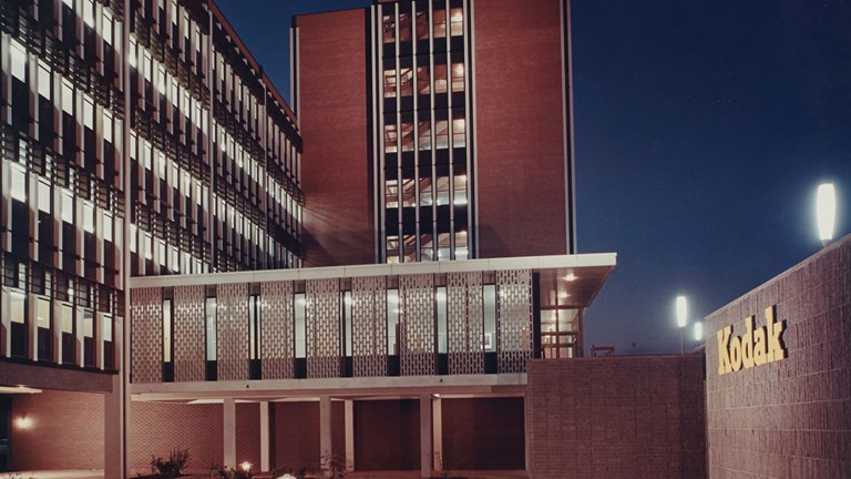 Exterior of a 1950s office building at night