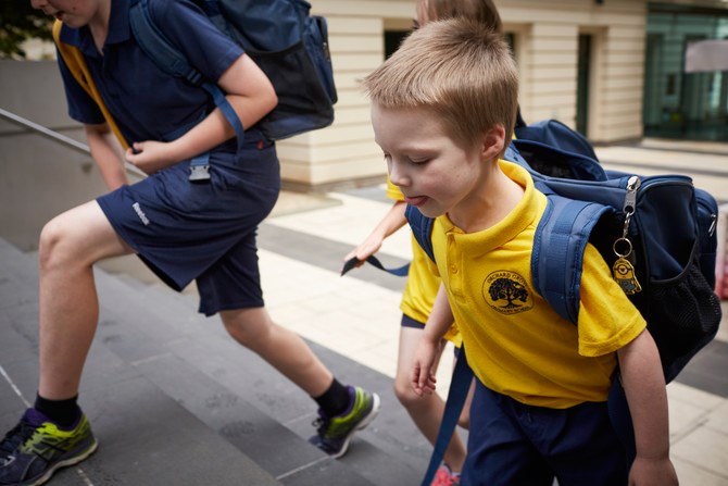 School Children on steps of the Immigration Museum.