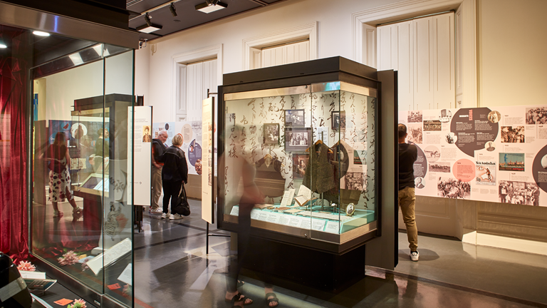 View of the Voices Across Time exhibition at Immigration Museum, showing redeveloped Timeline graphic