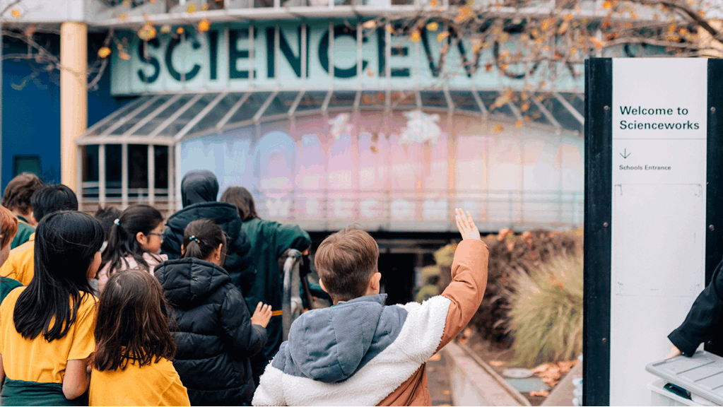 A group of school children getting ready to go into Scienceworks.